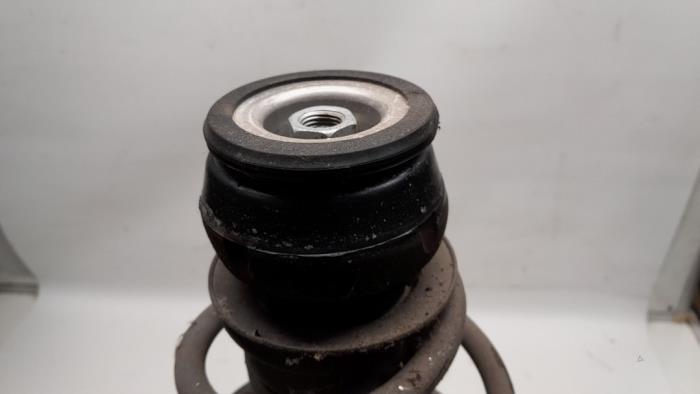 Fronts shock absorber, left from a Audi A1 Sportback (8XA/8XF) 1.2 TFSI 2014