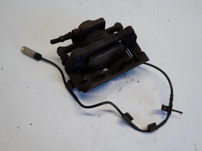 Front brake calliper, left from a MINI Mini (R56) 1.6 16V Cooper 2008