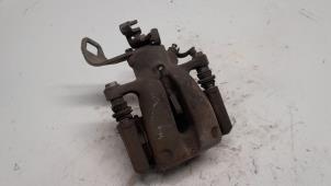 Used Rear brake calliper, right Mini Mini (R56) 1.4 16V One Price € 36,75 Margin scheme offered by Reclycar De Boer BV