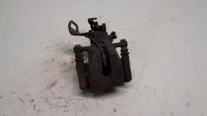 Used Rear brake calliper, left Mini Mini (R56) 1.6 16V Cooper Price € 36,75 Margin scheme offered by Reclycar De Boer BV