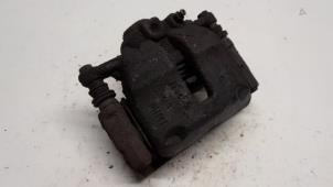 Used Front brake calliper, left Mini Mini (R56) 1.4 16V One Price € 21,00 Margin scheme offered by Reclycar De Boer BV