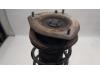 Fronts shock absorber, left from a MINI Mini (R56) 1.4 16V One 2009