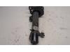 Fronts shock absorber, left from a MINI Mini (R56) 1.4 16V One 2009
