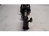 Fronts shock absorber, left from a Kia Picanto (JA) 1.0 12V 2018