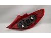 Taillight, left from a Opel Corsa D 1.4 16V Twinport 2008