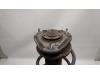Fronts shock absorber, left from a Toyota Corolla Verso (R10/11) 1.6 16V VVT-i 2004
