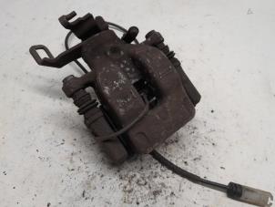 Used Rear brake calliper, left Mini Countryman (R60) 1.6 16V One Price € 36,75 Margin scheme offered by Reclycar De Boer BV