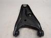 Front lower wishbone, left from a Renault Express 1.5 dCi 75 2023