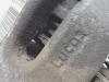 Rear brake calliper, left from a Peugeot 207 CC (WB) 1.6 16V THP 2009