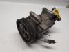 Air conditioning pump from a Renault Clio III (BR/CR), 2005 / 2014 1.6 16V, Hatchback, Petrol, 1.598cc, 82kW (111pk), FWD, K4M800; K4M801, 2005-06 / 2014-12, BR/CR0B/Y; BR/CR1B; BR/CR1M; BR/CR05; BR/CRCB 2006