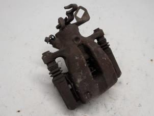 Begagnade Bakre bromsok, vänster Mini Mini (R56) 1.4 16V One Pris € 26,25 Marginaltabell erbjuds av Reclycar De Boer BV