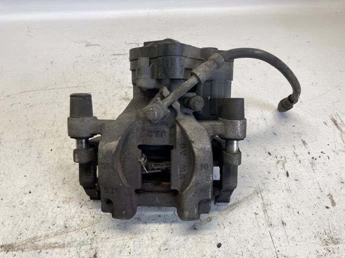 Gebrauchte Bremszange links hinten Volkswagen Tiguan (AD1) 2.0 TDI 16V BlueMotion Technology SCR Preis € 131,25 Margenregelung angeboten von Reclycar De Boer BV