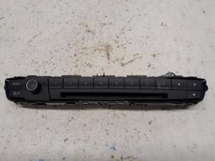 Begagnade Radiokontrollpanel BMW 1 serie (F20) 120i 1.6 16V Pris € 26,25 Marginaltabell erbjuds av Reclycar De Boer BV