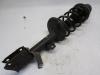 Fronts shock absorber, left from a Dacia Duster (HS), 2009 / 2018 1.2 TCE 16V, SUV, Petrol, 1.198cc, 92kW (125pk), FWD, H5F410; H5FF4, 2015-06 / 2018-01, HSDCW 2015