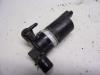 Windscreen washer pump from a Renault Grand Scénic III (JZ) 1.5 dCi 110 2014