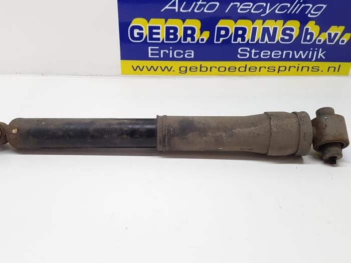 Rear shock absorber, left from a Renault Megane III Grandtour (KZ) 1.5 dCi 90 2012