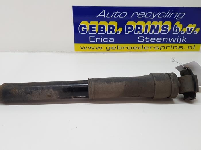 Rear shock absorber, left from a Renault Megane III Grandtour (KZ) 1.5 dCi 90 2012