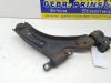 Front lower wishbone, left from a Daewoo Spark 1.0 16V Bifuel 2014