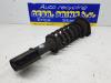Front shock absorber rod, left from a Suzuki Alto (SH410) 1.0 16V 2001