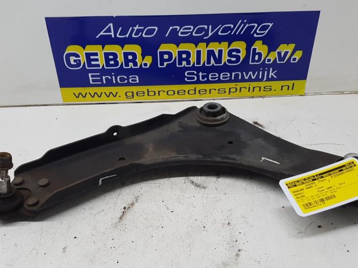Front lower wishbone, left from a Renault Megane III Coupe (DZ) 1.5 dCi 110 2009