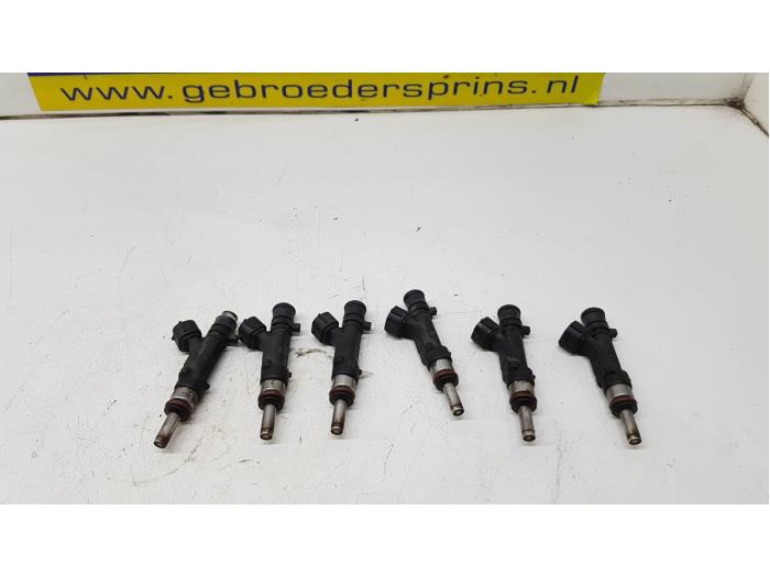 Injector (petrol injection) from a Audi A6 2005