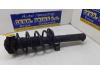 Front shock absorber rod, left from a Volkswagen Eos (1F7/F8) 2.0 FSI 16V 2009