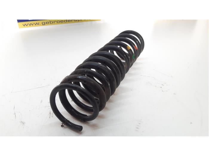 Rear coil spring from a Ford Focus 3 Wagon 1.0 Ti-VCT EcoBoost 12V 125 2014