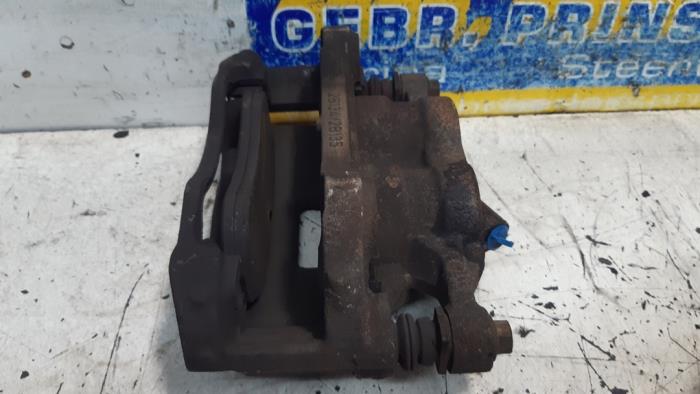 Front brake calliper, left from a Ford Transit Custom 2.0 TDCi 16V Eco Blue 130 2017