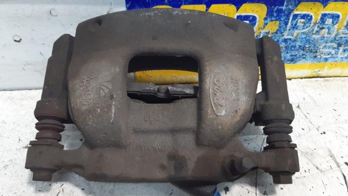Front brake calliper, left from a Ford Transit Custom 2.0 TDCi 16V Eco Blue 130 2017