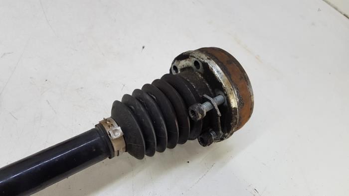 Front drive shaft, left from a Volkswagen Polo V (6R) 1.4 16V 2009