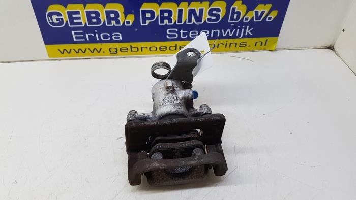 Rear brake calliper, left from a Opel Corsa E 1.3 CDTi 16V ecoFLEX 2015