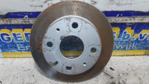 Used Front brake disc Daihatsu Cuore (L251/271/276) 1.0 12V DVVT Price € 10,00 Margin scheme offered by Autorec. Gebr. Prins b.v.