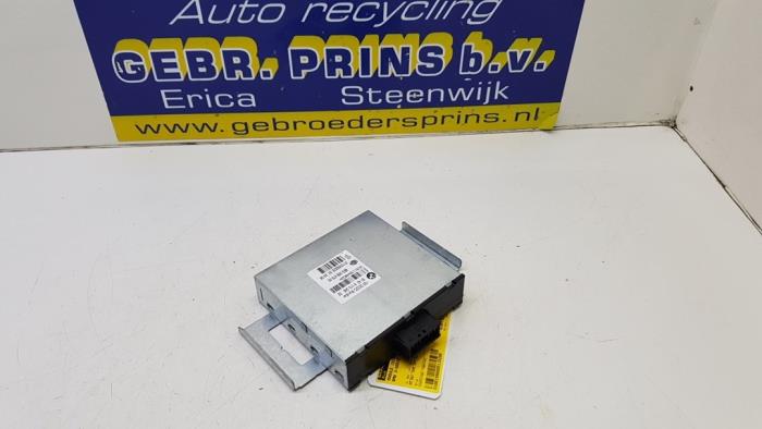 Module (miscellaneous) from a BMW 3 serie Touring (E91) 318i 16V 2008