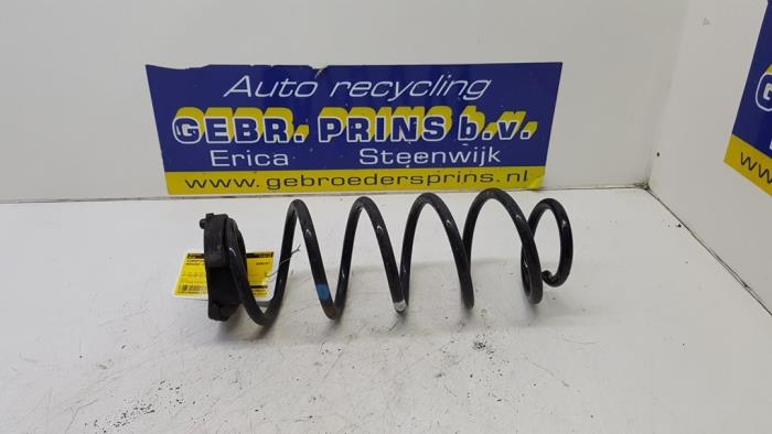 Rear coil spring from a Mercedes-Benz B (W247) 1.3 B-180 Turbo 16V 2021