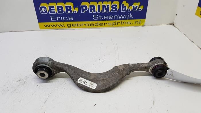 Rear upper wishbone, left from a BMW 5 serie Touring (G31) 523d 2.0 TwinPower Turbo 16V 2017