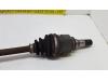 Front drive shaft, left from a Toyota Yaris II (P9) 1.0 12V VVT-i 2007