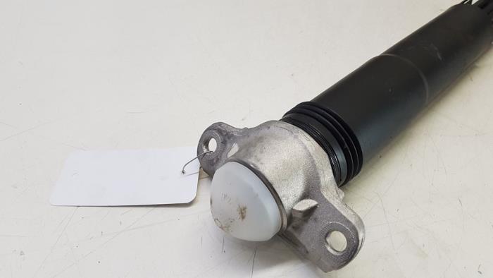 Rear shock absorber, left from a Volkswagen Polo VI (AW1) 1.0 TSI 12V 2021