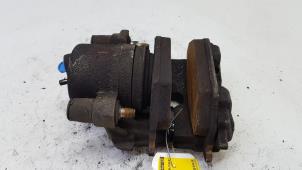 Used Front brake calliper, left Volkswagen Up! (121) 1.0 12V 60 Price € 25,00 Margin scheme offered by Autorec. Gebr. Prins b.v.