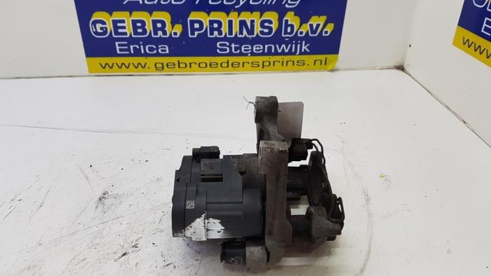 Rear brake calliper, left from a Skoda Superb Combi (3V5) 2.0 TDI 2019