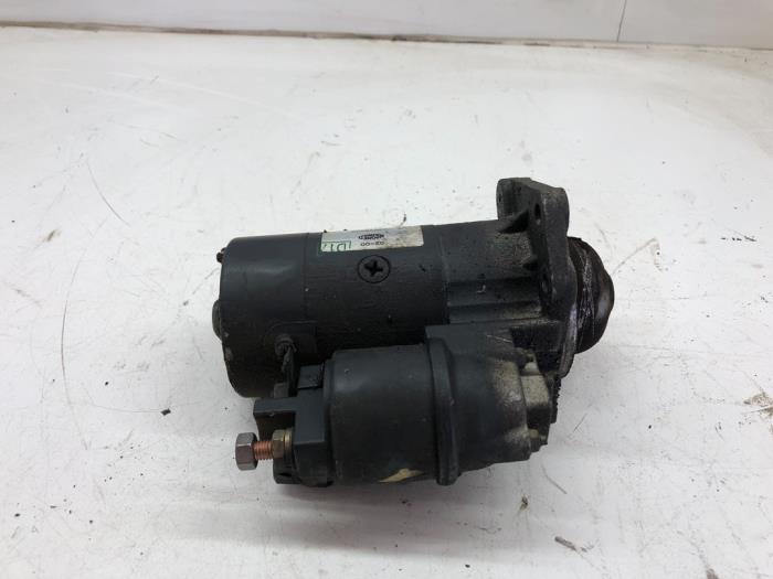 Starter from a Volkswagen Polo III (6N2) 1.4 2000