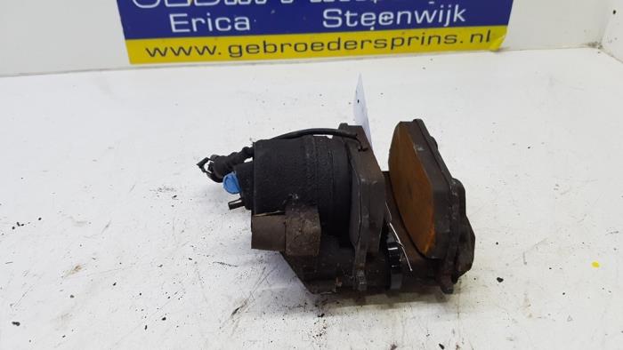 Front brake calliper, right from a Volkswagen Golf VII (AUA) 1.2 TSI BlueMotion 16V 2014