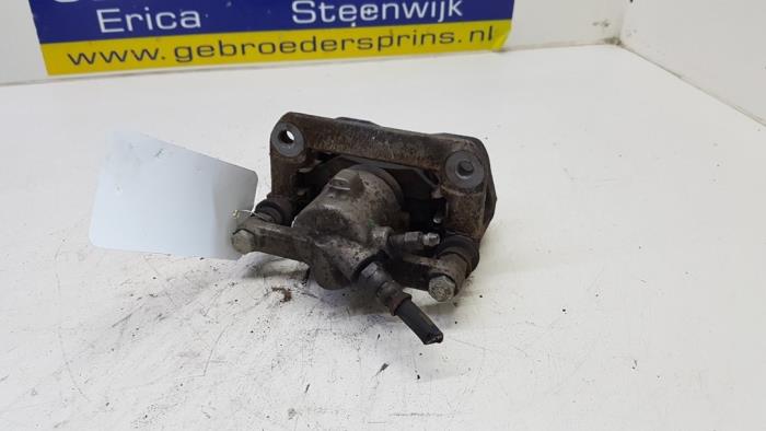 Rear brake calliper, left from a Mercedes-Benz A (W169) 1.5 A-160 2012