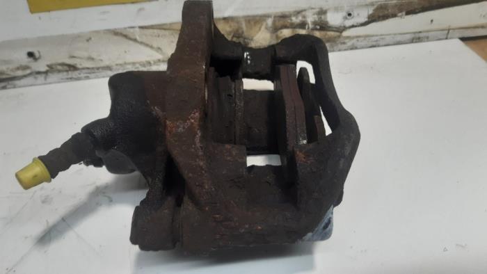 Front brake calliper, left from a Renault Kangoo Express (FC) 1.5 dCi 80 2003