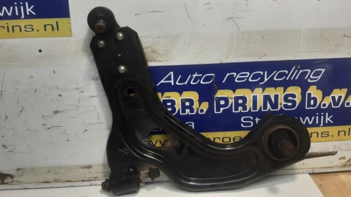 Front lower wishbone, right from a Ford Fiesta 4 1.3i 2001