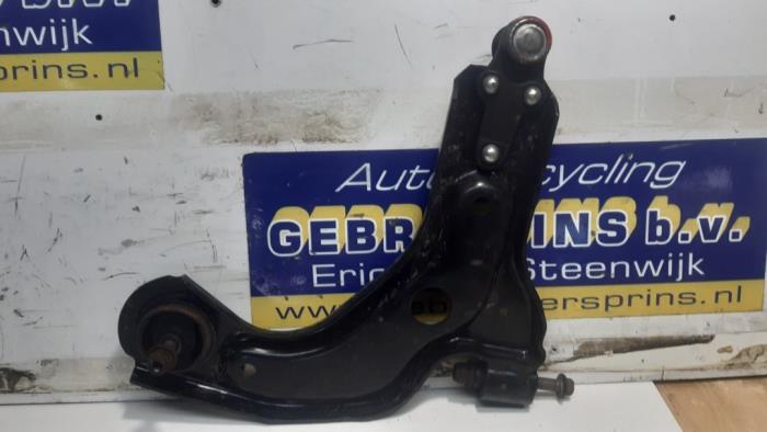 Front lower wishbone, right from a Ford Fiesta 4 1.3i 2001