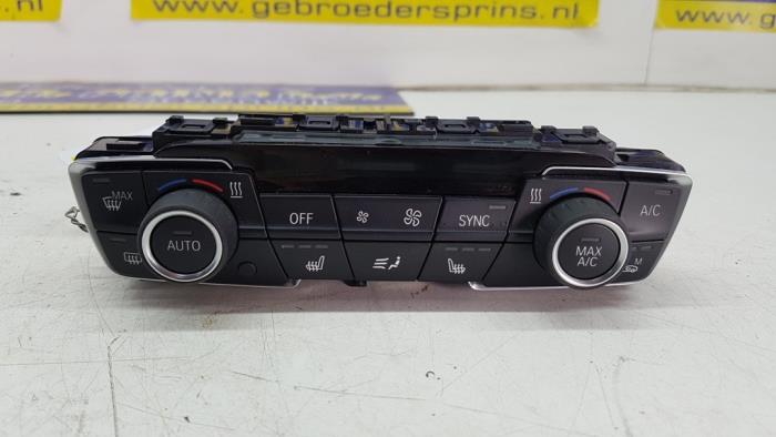 Heater control panel from a BMW 2 serie Gran Tourer (F46) 218i 1.5 TwinPower Turbo 12V 2016