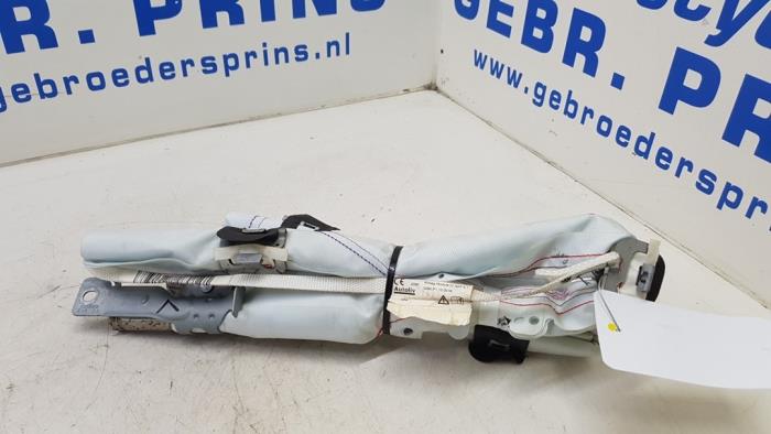 Roof curtain airbag, left from a Peugeot 208 I (CA/CC/CK/CL) 1.4 HDi 2013
