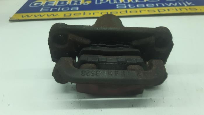Rear brake calliper, right from a Nissan Juke (F15) 1.6 16V 2012