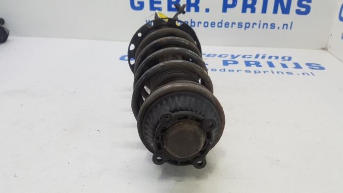 Front shock absorber rod, left from a Opel Astra H (L48) 1.8 16V 2009