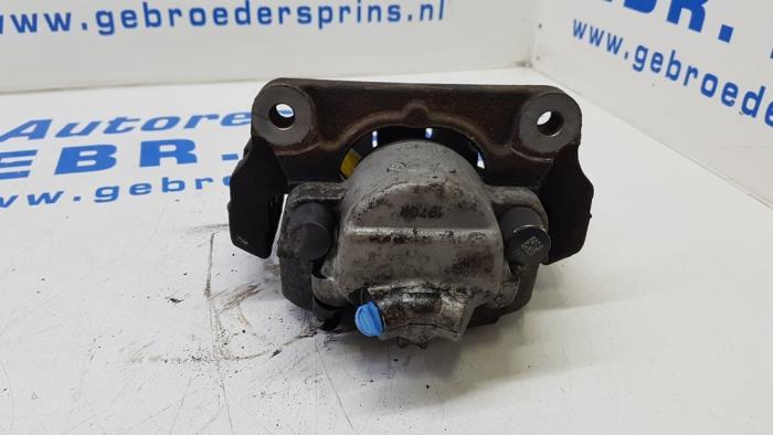 Front brake calliper, left from a BMW 5 serie (F10) 523i 24V 2010